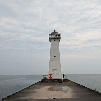 Sodus Point Beach - The pier lighthouse at Sodus Point Beach - Beaches Near Me - Sodus Point, New York