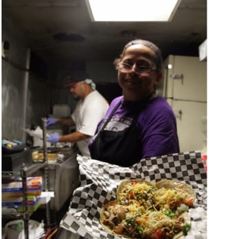Gracie's Kitchen - Ms Gracie with some mini tacos - Food Trucks Near Me