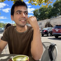 Sanket with his Matcha Latte Sanket with his Matcha Latte