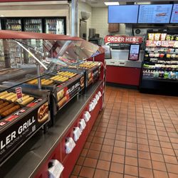 QuikTrip - Hot Dog, Taquitos, Egg-rolls and Corndog Bar. Background is ordering station.