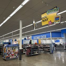 Dollar store items located at the non grocery entrance of the store.
