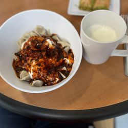 Istanbul Cafe and Bakery - Mant, Small beef dumplings with garlic yogurt sauce and spices.