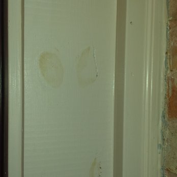 Storey Construction - This is trim next to the front door...they skipped priming the cedar wood and so sap stains appeared about a week after installation. - Painters Near Me - Austin, Texas