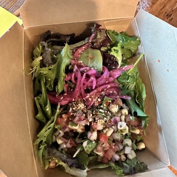 Cococ - a salad in a box on a table - Mexican Near Me Cococ - a salad in a box on a table - Mexican Near Me