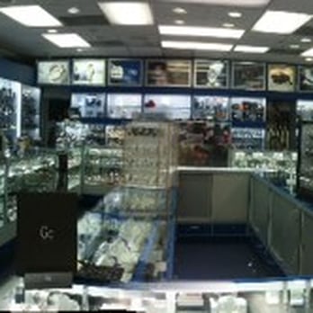 Watch Plaza - This photo of the inside of the store (just before several more customers entered) was shot by stitching together a panorama. - Watches Near Me - Miami, Florida Watch Plaza - This photo of the inside of the store (just before several more customers entered) was shot by stitching together a panorama. - Watches Near Me - Miami, Florida