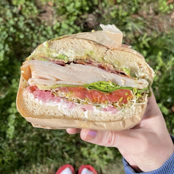 Good Bagels - turkey club with additions, the height of which necessitate it be eaten outdoors - Coffee & Tea Near Me - Anacortes, Washington