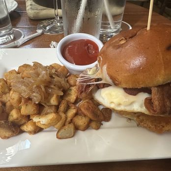 Broadstone Bar & Kitchen - The hangover sandwich with potatoes topped off with caramelized onions - New American Near Me - New York, New York Broadstone Bar & Kitchen - The hangover sandwich with potatoes topped off with caramelized onions - New American Near Me - New York, New York