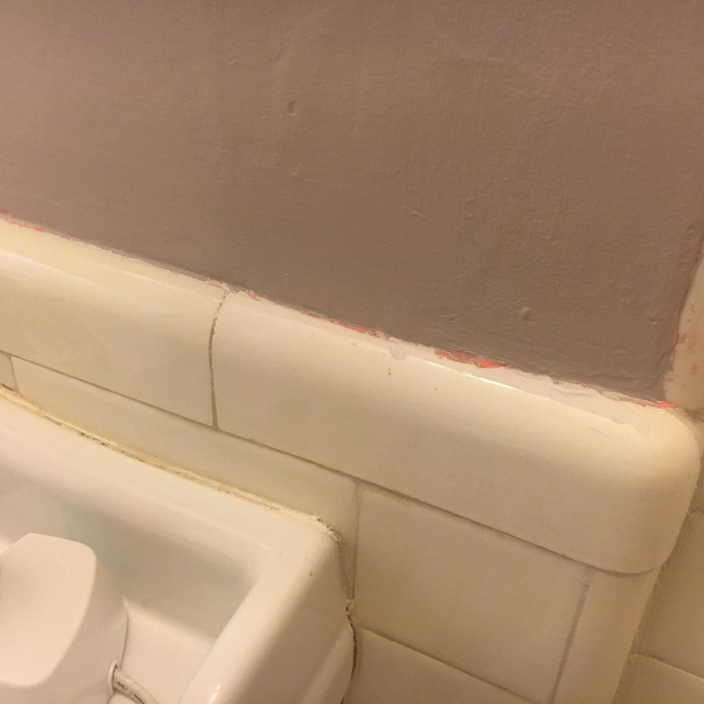 Paintzen - New York - Old paint showing through seam with tile. - Painters Near Me - New York, New York Paintzen - New York - Old paint showing through seam with tile. - Painters Near Me - New York, New York