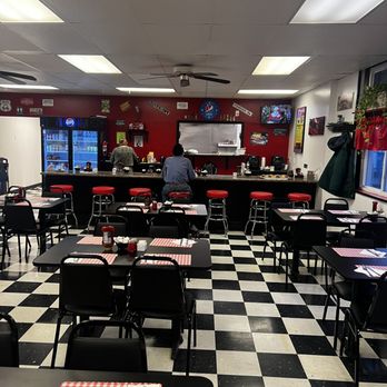 Mels Diner - checkered floor and tables - Breakfast & Brunch Near Me - Plattsburgh, New York Mels Diner - checkered floor and tables - Breakfast & Brunch Near Me - Plattsburgh, New York