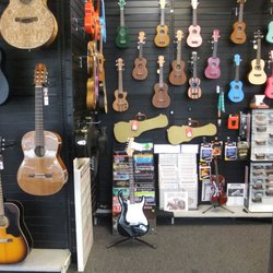 Guitars and More - Sale ukulele $29.99, electric guitar package $149.99, acoustic guitars $79.99, Violins $149.99, microphones $19.99 , so much more on sale!!!