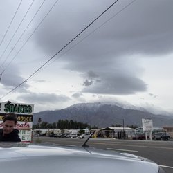 Windmill Market & Produce - Snow covered mountains beckon from the parking lot.