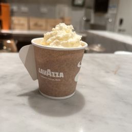 espresso con panna cream in togo cup. cool design (handle) espresso con panna cream in togo cup. cool design (handle)