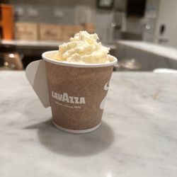 Lavazza - espresso con panna cream in togo cup. cool design (handle)