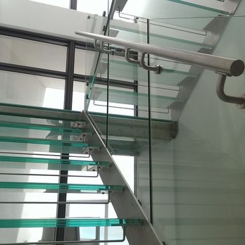 Bella Stairs - Dual Stringer Staircase with Frosted Glass Treads & Landing, Tempered Glass Railings, & Stainless Steel Elements - Penthouse in South Beach - Building Supplies Near Me - Spring Hill, Florida Bella Stairs - Dual Stringer Staircase with Frosted Glass Treads & Landing, Tempered Glass Railings, & Stainless Steel Elements - Penthouse in South Beach - Building Supplies Near Me - Spring Hill, Florida