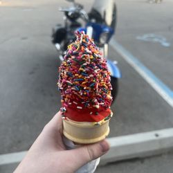 Custard Time - Cone with cherry dip and rainbow sprinkles