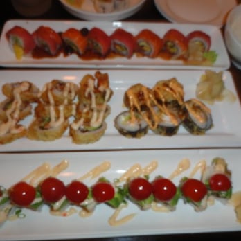 Umi Sake House - From Top, Tropica Paradise Roll, Left Seattle Crunch Roll, Righ Bad Boy Roll, Bottom Green Decadense (first round) - Sushi Bars Near Me - Seattle, Washington Umi Sake House - From Top, Tropica Paradise Roll, Left Seattle Crunch Roll, Righ Bad Boy Roll, Bottom Green Decadense (first round) - Sushi Bars Near Me - Seattle, Washington