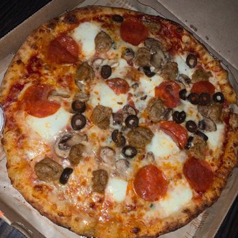 Blaze Pizza - Build your own pizza with pepperoni, Italian sausage, black olives, mushrooms on mozzarella and red sauce - Pizza Near Me - Tampa, Florida Blaze Pizza - Build your own pizza with pepperoni, Italian sausage, black olives, mushrooms on mozzarella and red sauce - Pizza Near Me - Tampa, Florida