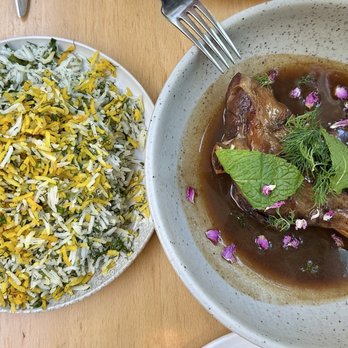 Delara - Braised lamb shank with rice tossed with an abundance of fresh herbs - Persian/Iranian Near Me - Vancouver, British Columbia Delara - Braised lamb shank with rice tossed with an abundance of fresh herbs - Persian/Iranian Near Me - Vancouver, British Columbia