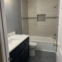 Love the midnight vanity, floor and shower tiles and the accent tile for the niche I ordered through Mosaic