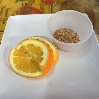 Dos Taquitos - For our shots! Tajin and oranges to go with our tequila shots. - Mexican Near Me - Raleigh, North Carolina