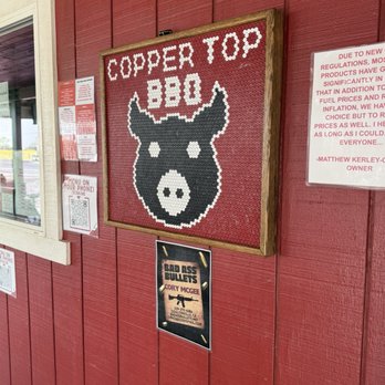 Copper Top BBQ - Cute sign. I asked the owner what kind of wood did they use and he said Almond. I could have sworn they had a sign that said oak. - Barbeque Near Me - Big Pine, California