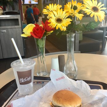 McDonald's - a hamburger and a drink on a tray - Burgers Near Me - Hot Springs Village, Arkansas McDonald's - a hamburger and a drink on a tray - Burgers Near Me - Hot Springs Village, Arkansas