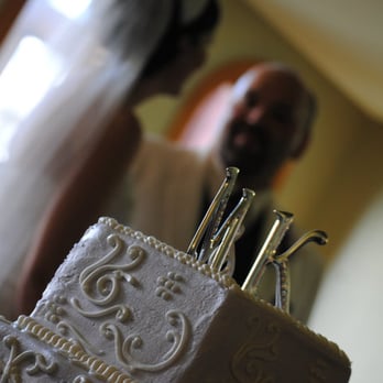 Superstar Entertainment - a bride and groom in front of a wedding cake - Karaoke Near Me - Corinth, Texas Superstar Entertainment - a bride and groom in front of a wedding cake - Karaoke Near Me - Corinth, Texas