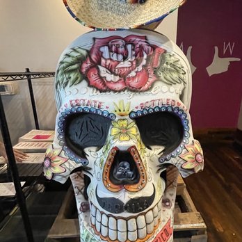 MEX - a skull with a straw hat on top of it - Mexican Near Me - Bloomfield Hills, Michigan