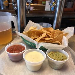 Nick & Jimmy's Bar & Grill - Chips and dip trio. Enough sauces so you won't run out before the chips are gone!