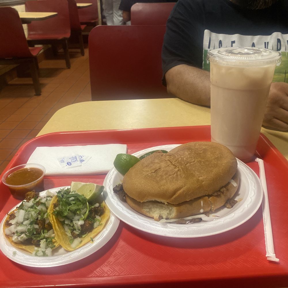 Asada Torta, tacos de pastor and a large horchata Asada Torta, tacos de pastor and a large horchata