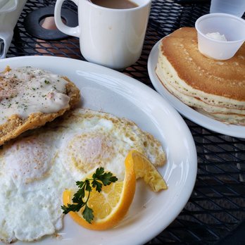 Stacks Pancake House - Chicken fried steak, over medium with a side of shortstack. - Breakfast & Brunch Near Me - Dana Point, California Stacks Pancake House - Chicken fried steak, over medium with a side of shortstack. - Breakfast & Brunch Near Me - Dana Point, California