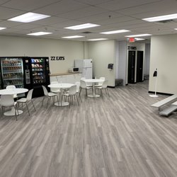 ZZ DANCE - Student lounge angle 1 to showcase ZZ EATS station as well vending machines that support ApplePay, GooglePay, cash, and card payments.