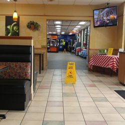 Subway - It has its own entrance can enter through the Pilot truck stop very clean nice atmosphere and the little sitting area with plugs