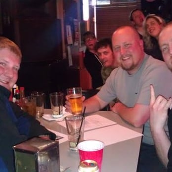 OutLoud Entertainment - a group of men sitting at a table - Karaoke Near Me OutLoud Entertainment - a group of men sitting at a table - Karaoke Near Me
