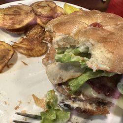 Bob's Train - Half eaten Bacon Mushroom Swiss Burger with chips.