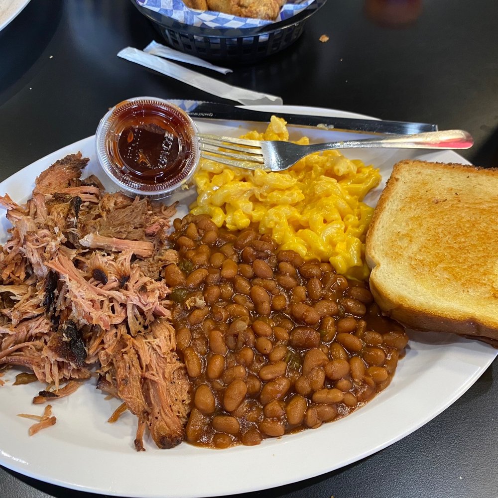 Q's Quisine - Pulled pork plate with Mac & cheese & baked beans!! The pork was so tender & tasty. You didn't even need the BBQ sauce. - Food Trucks Near Me