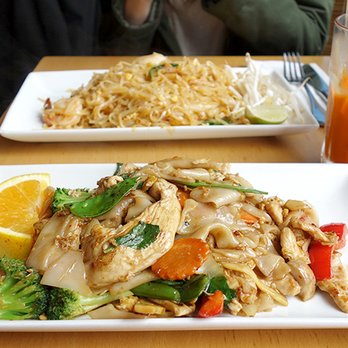 Pho Basil - Drunken Noodles (front), Pah Thai (back) with Thai Ice Tea in between. - Vietnamese Near Me - Boston, Massachusetts