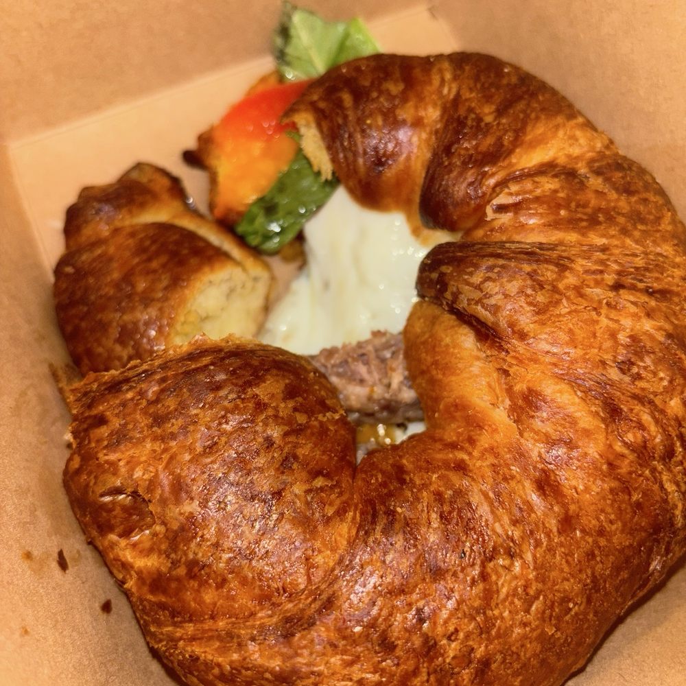 Oud Coffee & Cafe - Breakfast croissant with added sausage - Coffee & Tea Near Me - Chicago, Illinois Oud Coffee & Cafe - Breakfast croissant with added sausage - Coffee & Tea Near Me - Chicago, Illinois