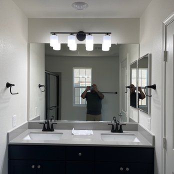 First Class Handyman - Placed vanity light, added hand towel bars and replaced faucets - Handyman Near Me