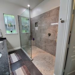 YourNextPainter & Remodeling - All new walk in shower.  Went from a tub/ shower combo to full, big shower.