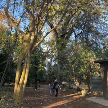 Gale Vineyards - a couple of people walking down a path - Wineries Near Me - Durham, California
