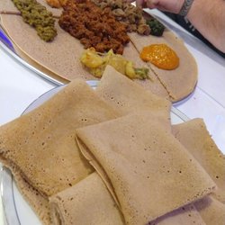 Queen Sheba - There's not really a build-your-own sample platter on the menu but they made us one anyway. A little of everything plus "spongy" (injera).