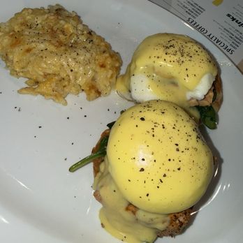 The Toasted Yolk Cafe - The Alaskan Benedict... English muffin, spinach, salmon and hollandaise sauce with a side of hash brown casserole - Breakfast & Brunch Near Me - Round Rock, Texas The Toasted Yolk Cafe - The Alaskan Benedict... English muffin, spinach, salmon and hollandaise sauce with a side of hash brown casserole - Breakfast & Brunch Near Me - Round Rock, Texas