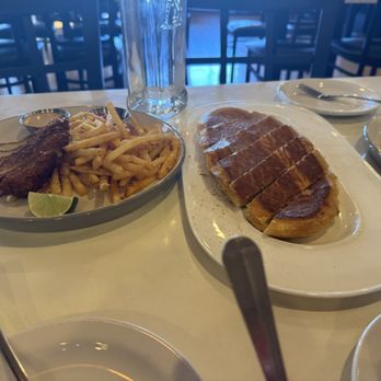 Oceana Restaurant - The delicately fried squid with fries and delicious special garlic bread - Seafood Near Me - Palm Desert, California Oceana Restaurant - The delicately fried squid with fries and delicious special garlic bread - Seafood Near Me - Palm Desert, California