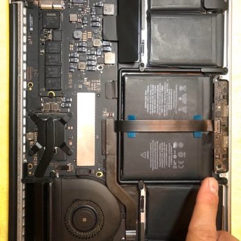 ComputerCare - Pointing to the only small area of corrosion, they essentially said everything here is corroded and needed to be replaced. - IT Services & Computer Repair Near Me - Seattle, Washington ComputerCare - Pointing to the only small area of corrosion, they essentially said everything here is corroded and needed to be replaced. - IT Services & Computer Repair Near Me - Seattle, Washington