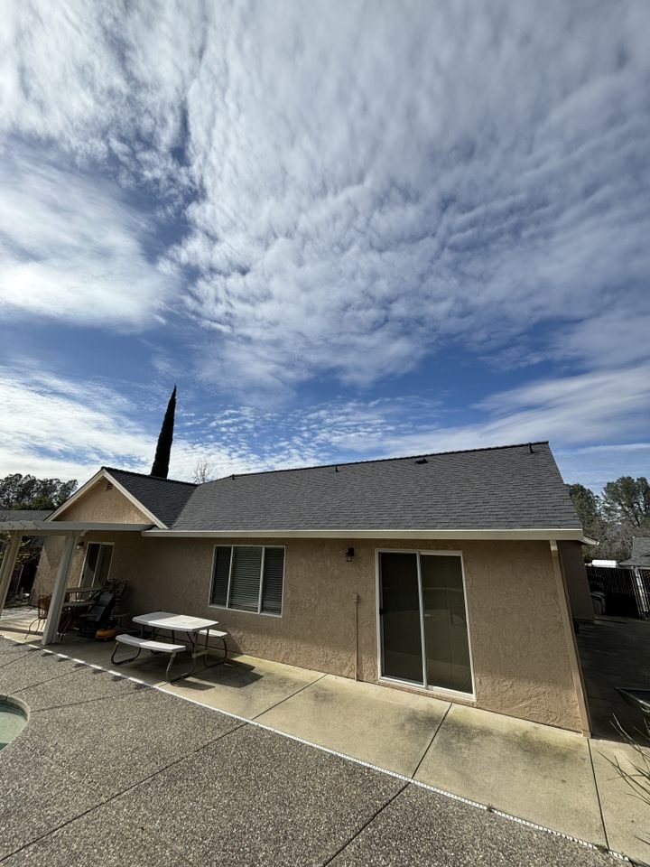 Slide of Tugwell Roofing