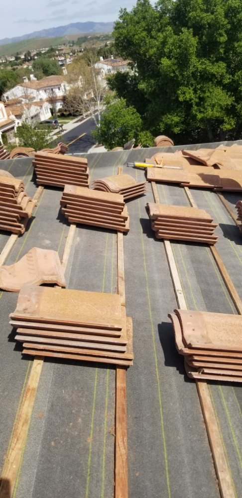 Slide of Perez Roofing