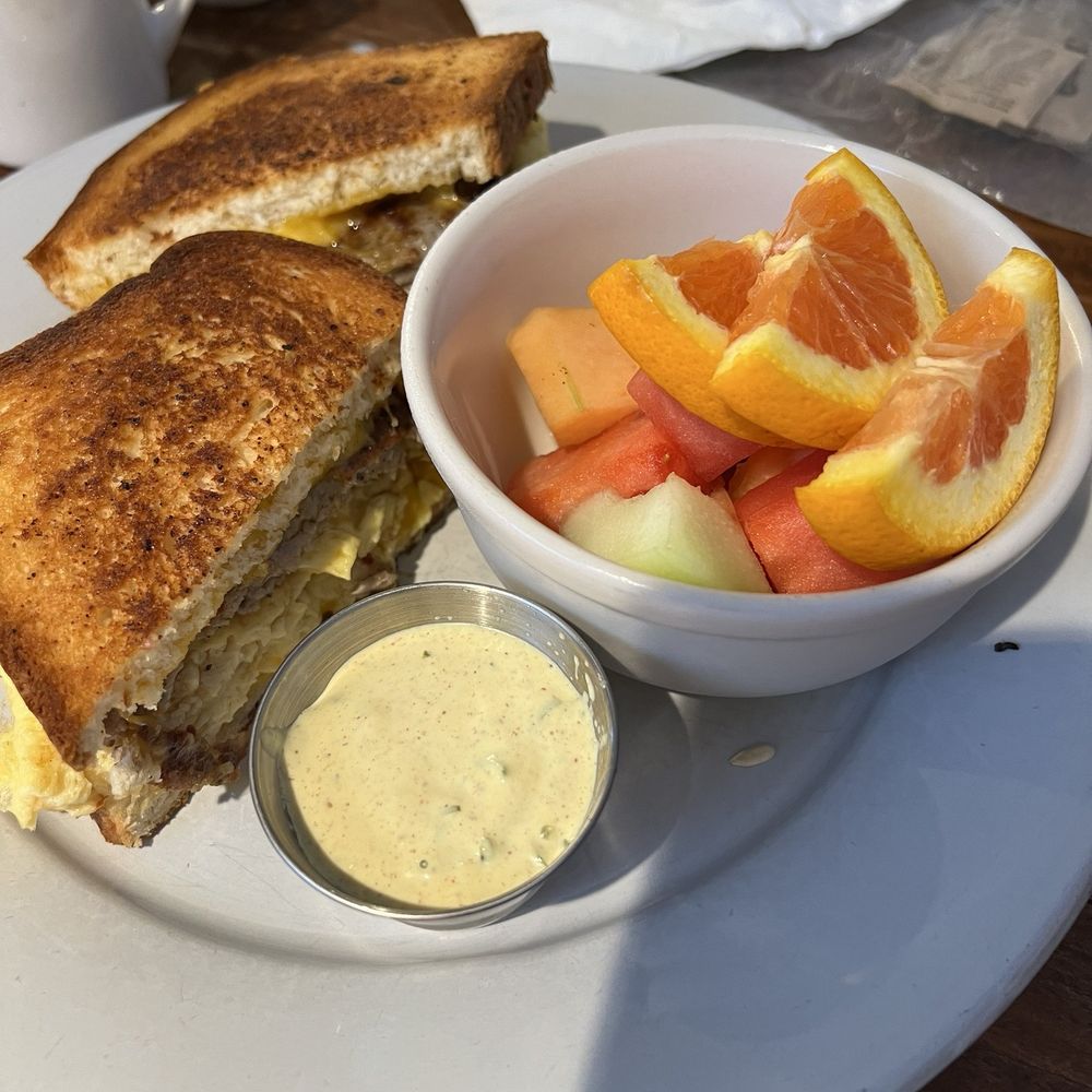 ACME Cafe - Breakfast sandwich with fruit - New American Near Me - Salem, Oregon ACME Cafe - Breakfast sandwich with fruit - New American Near Me - Salem, Oregon