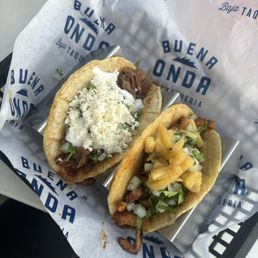 Short rib taco and Al Pastor taco Short rib taco and Al Pastor taco