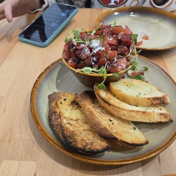 The Outpost - Bruschetta - Pizza Near Me - Riverside, California The Outpost - Bruschetta - Pizza Near Me - Riverside, California